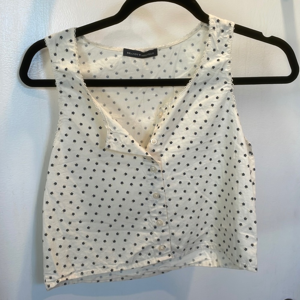 Brandy Melville white top with blue and yellow daisies